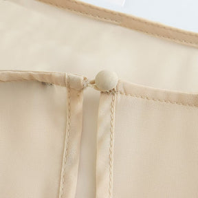 Blusa Capa Assimétrica